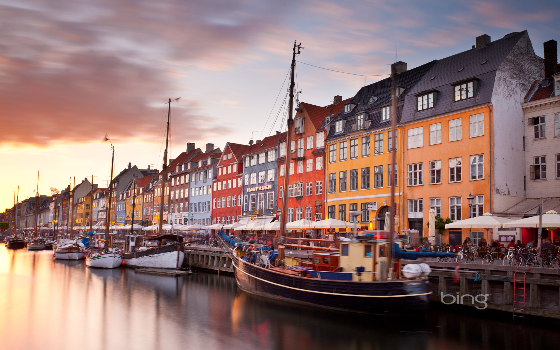 Colorful homes line Nyhavn Canal in Copenhagen, Denmark